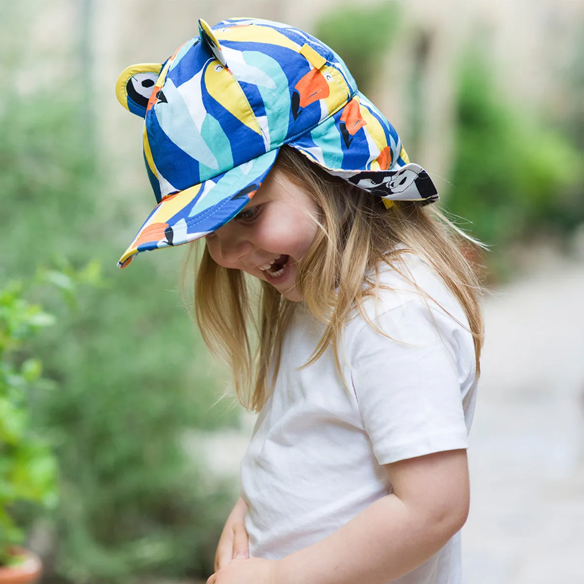 Kids Cub hat with neck flap: Toucan Play
