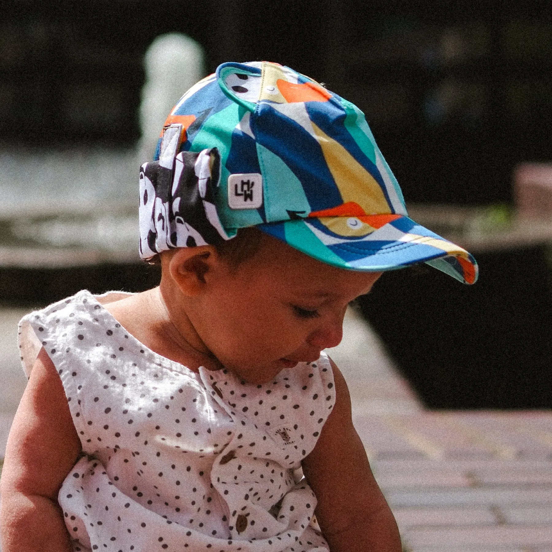 Kids Cub hat with neck flap: Toucan Play