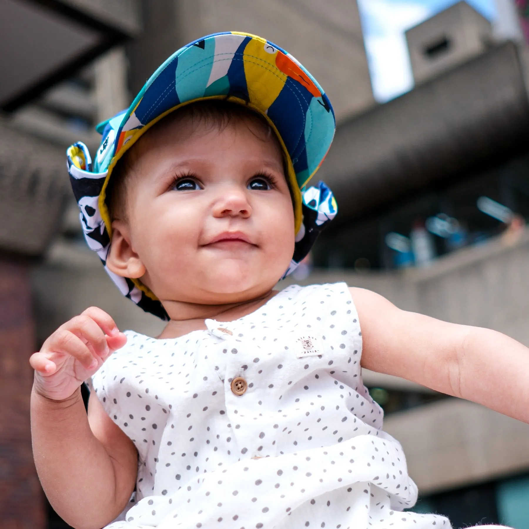 Kids Cub hat with neck flap: Toucan Play